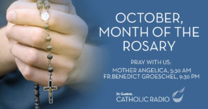 hand holding rosary