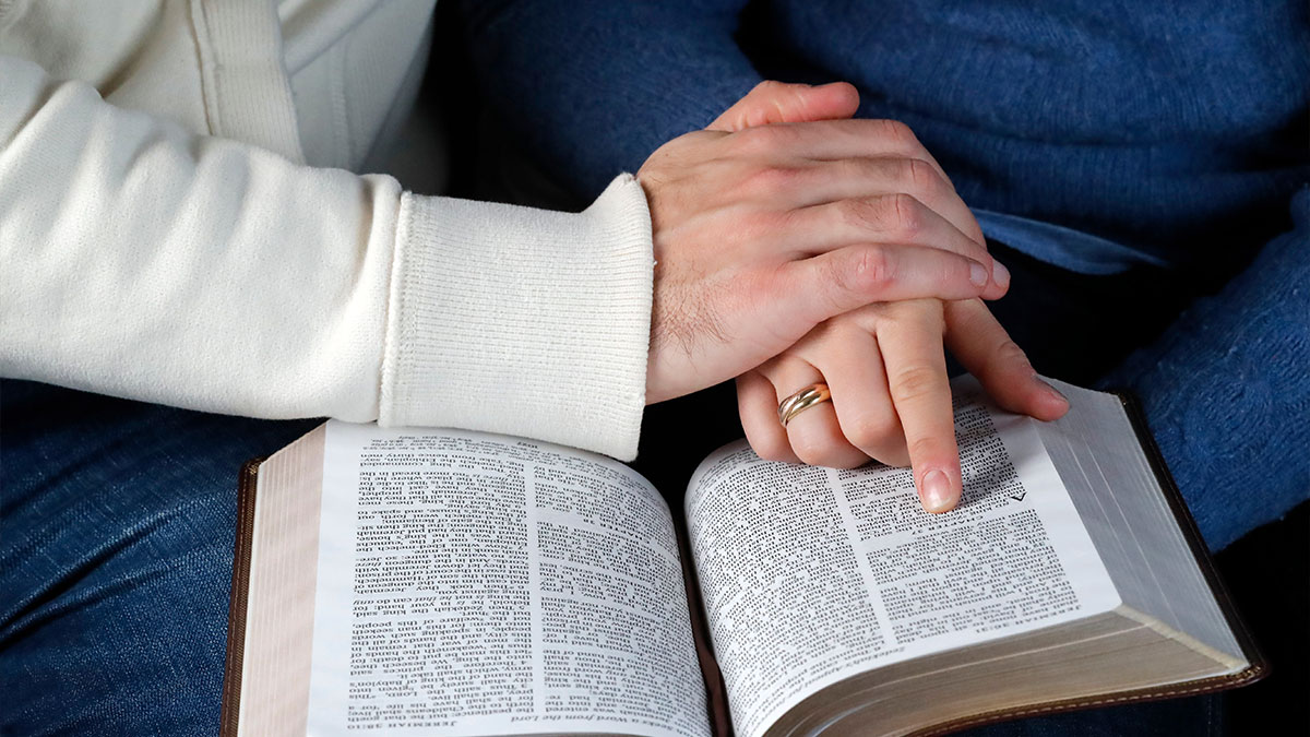 Couple reading Bible together