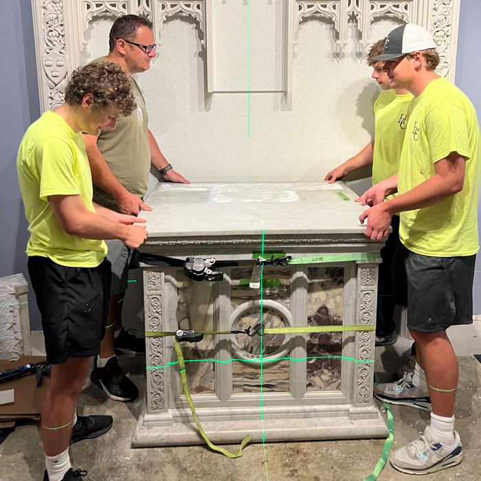 Team installing altar