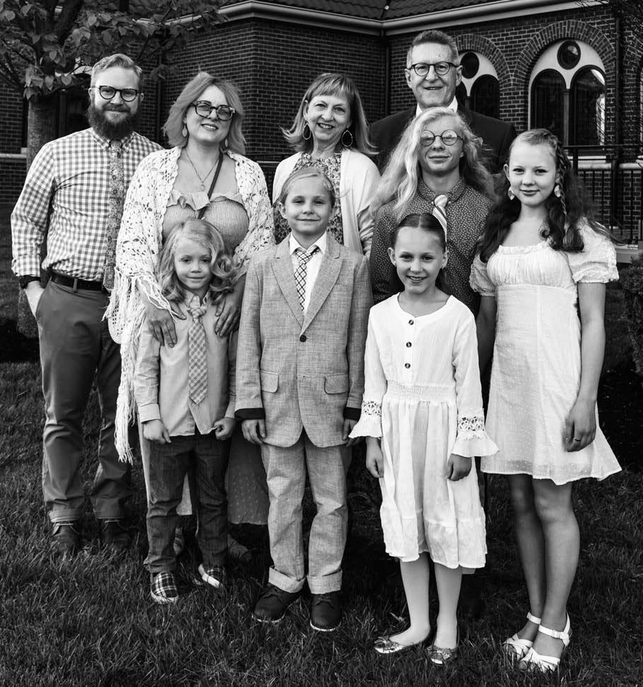 The Osborne family on the day Scott and his grandchildren entered the Church.